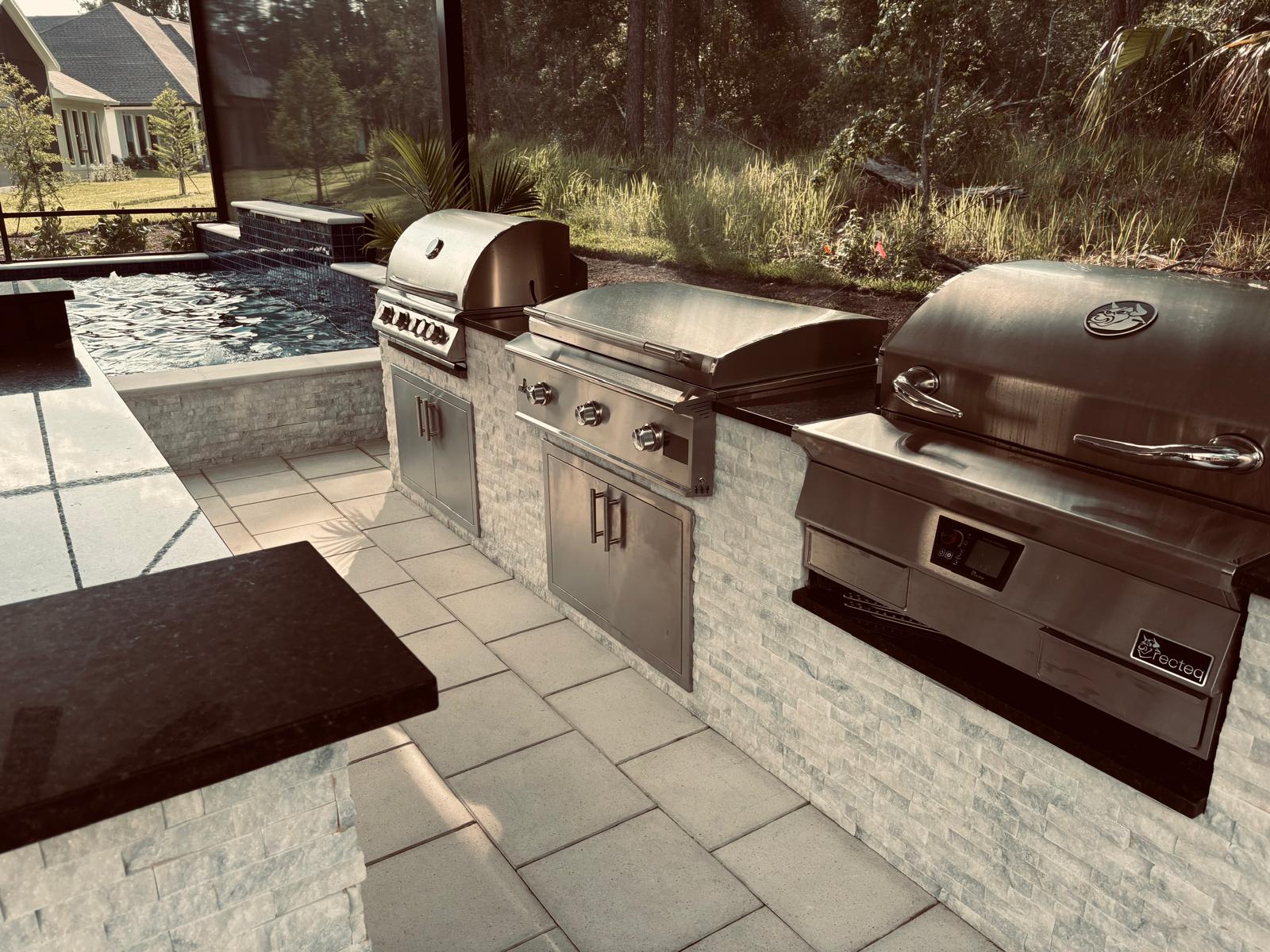 Custom BBQ island with stainless grills