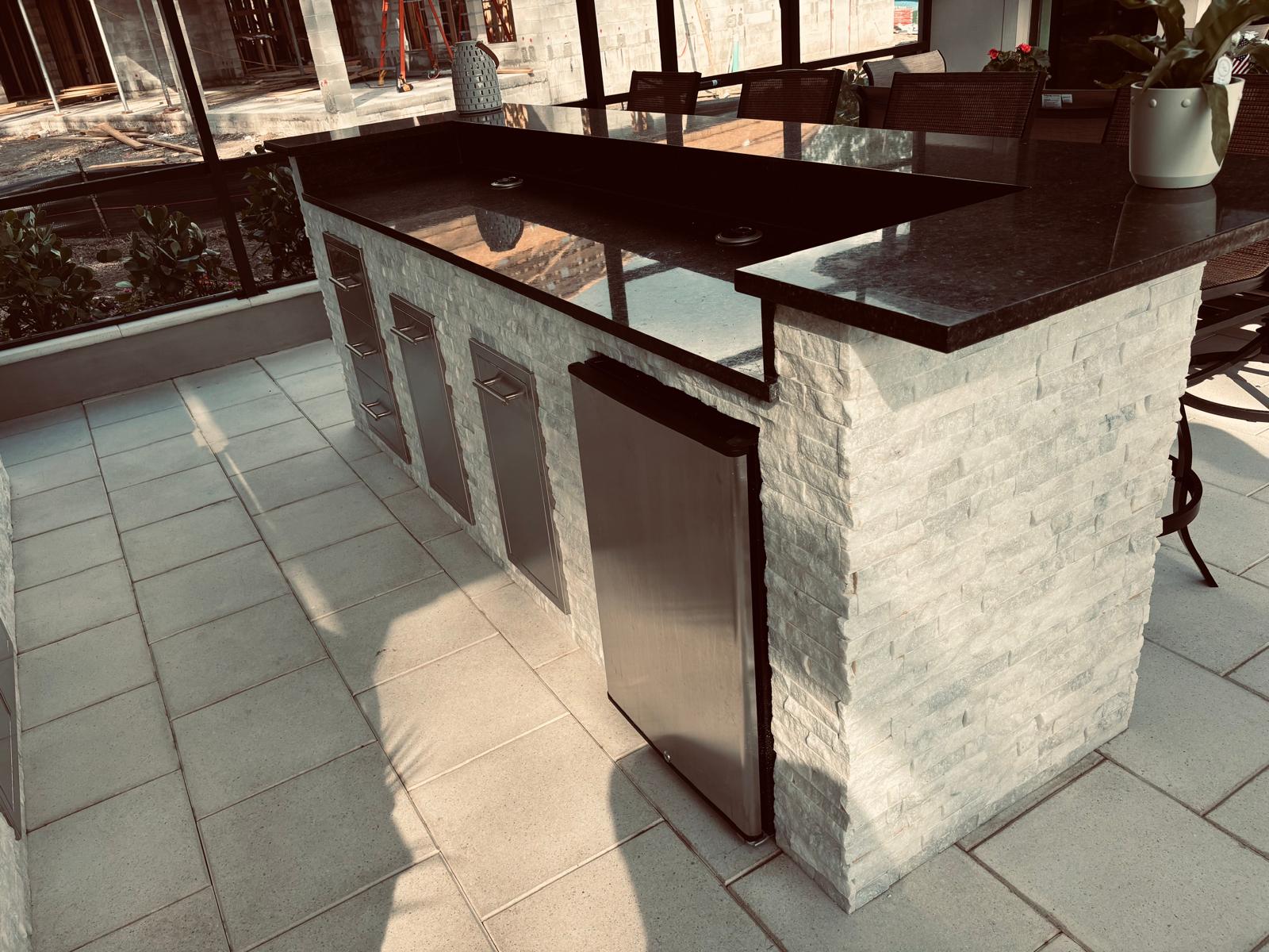 Luxury outdoor kitchen with granite countertop